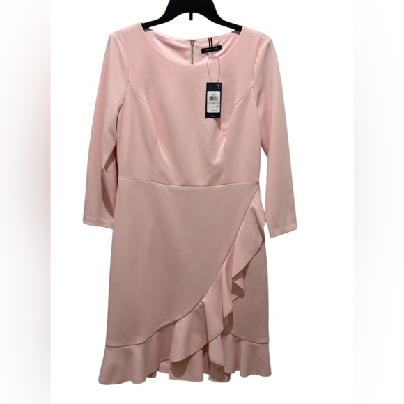 Tommy Hilfiger Dresses & Skirts - NWT. Tommy Hilfiger dress. Size 10. Zipper in back.